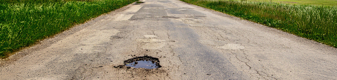 Michigan Pot Holes Can Damage Vehicle Wraps